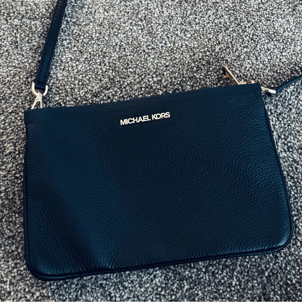 Michael Kors three pocket crossbody